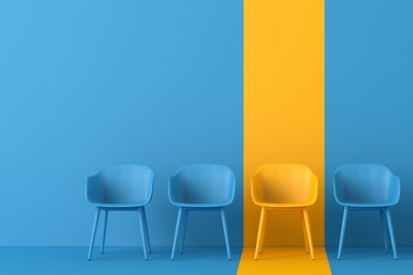 4 blue chairs and one yellow one