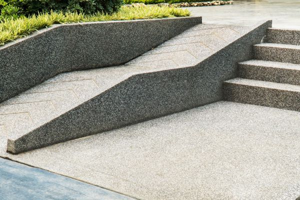Picture of a beautiful concrete ramp next to a set of 5 steps